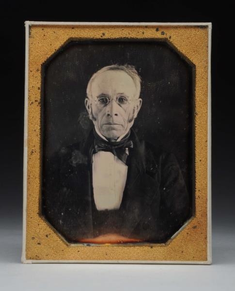 DAGUERREOTYPE OF A MAN WITH SPECTACLES.           