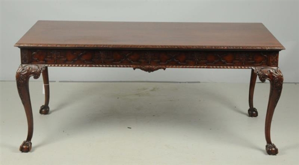 LARGE LIBRARY TABLE WITH BALL AND CLAW FEET.      