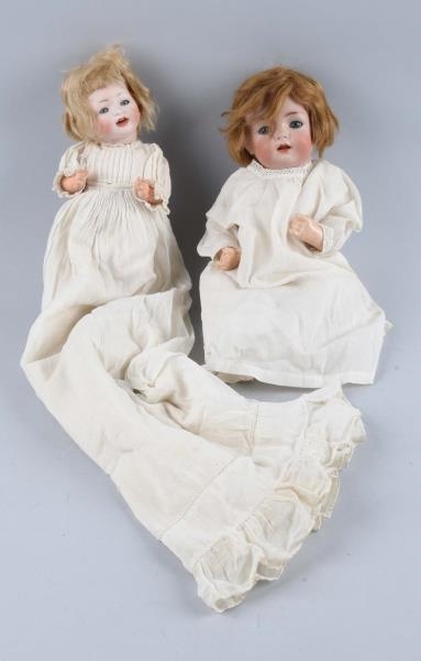 LOT OF 2: ANTIQUE BISQUE HEAD CHARACTER BABIES.   