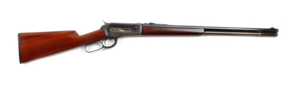 (C) WINCHESTER MODEL 1886 LEVER ACTION RIFLE.     