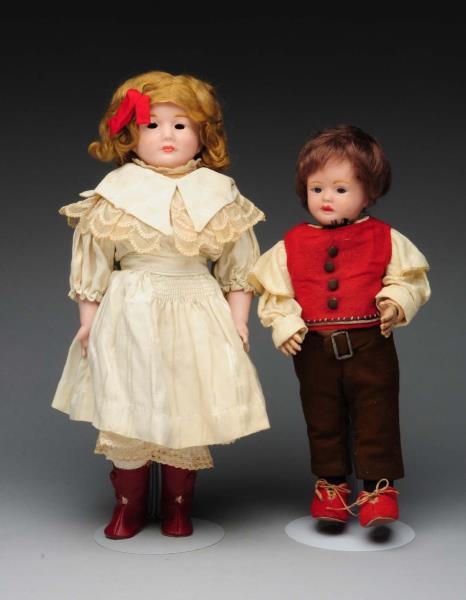LOT OF 2 ENGLISH BISQUE CHARACTER DOLLS.          