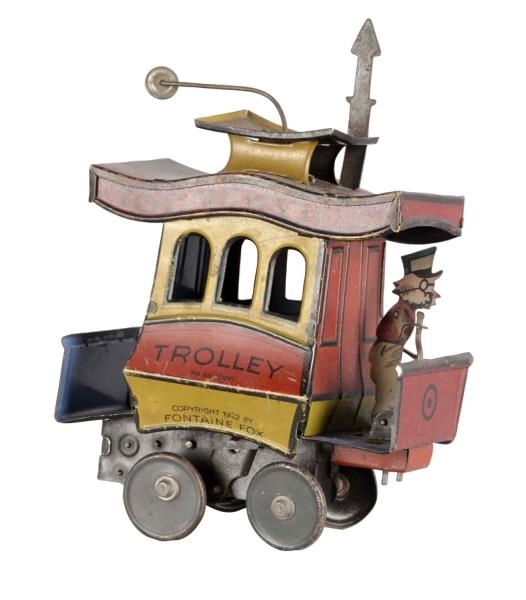 NIFTY MECHANICAL TIN LITHO TOONERVILLE TROLLEY    