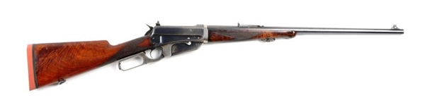 (C) WINCHESTER DELUXE MODEL 1895 T.D. RIFLE       