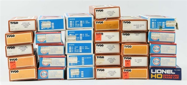 LARGE LOT OF ASSORTED  TYCO FREIGHT CARS.         