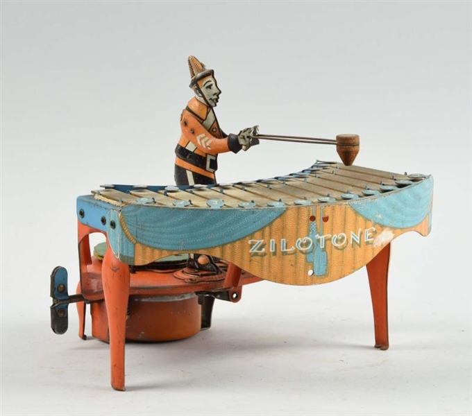 WOLVERINE TIN LITHO WIND UP XYLOPHONE PLAYER.     