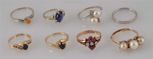 LOT OF 8: ASSORTED SILVER & GOLD RINGS.           