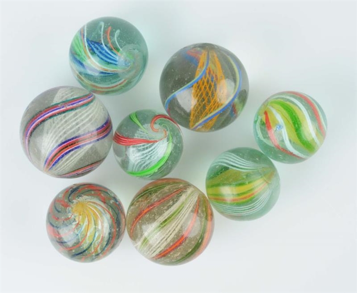 LOT OF 8: SWIRL MARBLES.                          