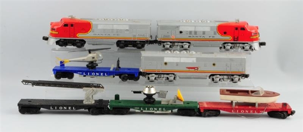LOT OF 7: LIONEL SANTA FE ABA WITH 4 FRIEGHT CARS.