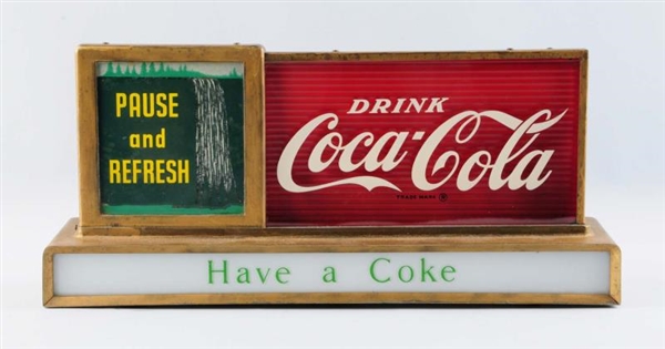 1950S COCA COLA COUNTER TOP MOTION SIGN.         