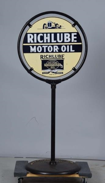 RICHLUBE MOTOR OIL WITH RACE CAR AT THE TOP SIGN. 