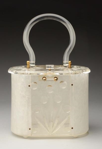 TALL MARBLE LUCITE PURSE.                         