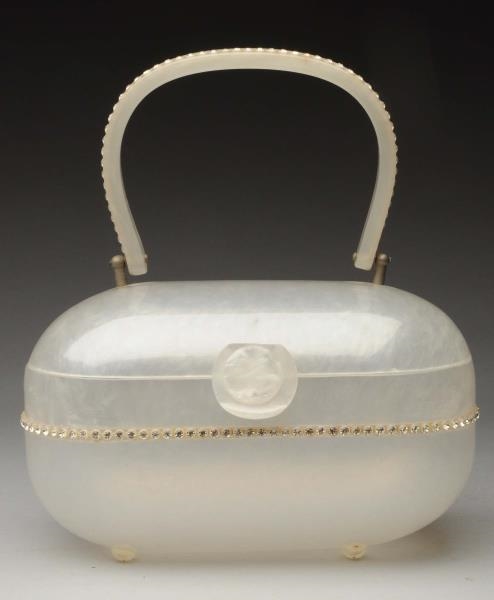 GILLI ROUND-SHAPED MARBLE LUCITE PURSE.           