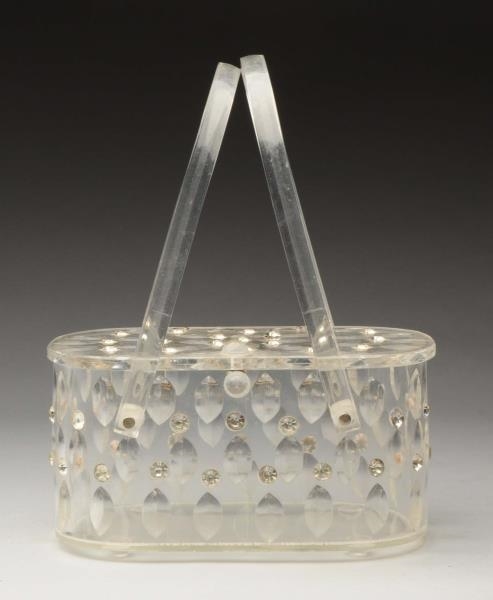 LLEWELLYN LUCITE PURSE WITH JEWELS.               