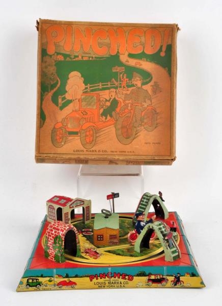 MARX TIN LITHO PINCHED MOTORCYCLE TOY.            