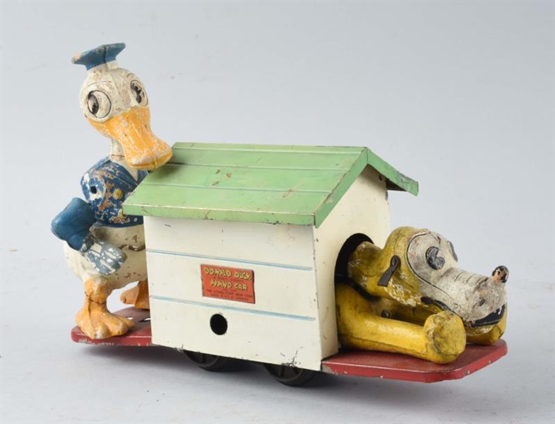 LIONEL WIND UP DONALD DUCK & PLUTO HAND CAR.      