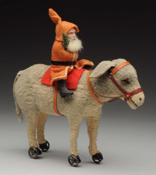 SANTA ON CANDY CONTAINER DONKEY.                  