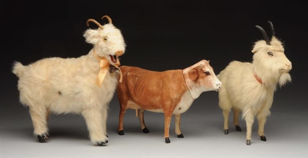 LOT OF 3: TWO GOATS AND COW TOY FIGURES.          