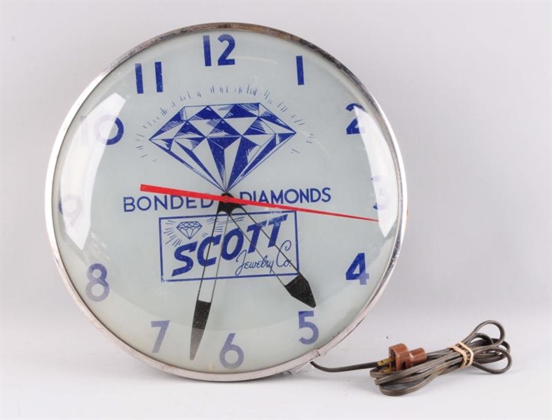SCOTT BONDED DIAMONDS TELECHRON CLOCK.            