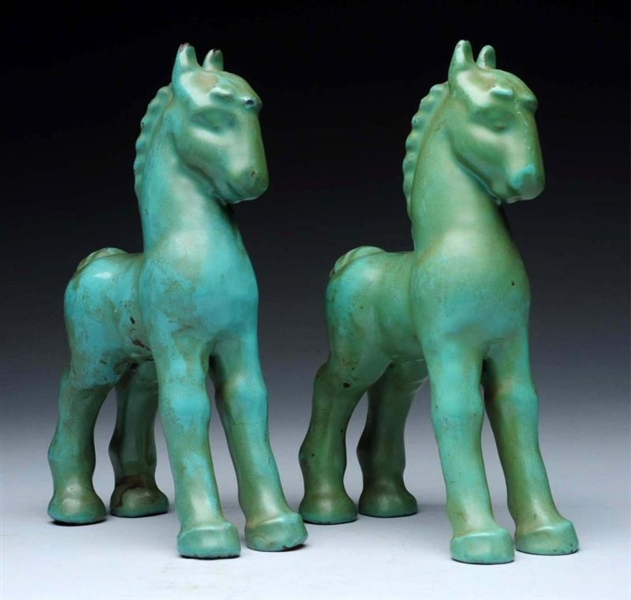 LOT OF 2: CAST IRON PAINTED HORSES.               