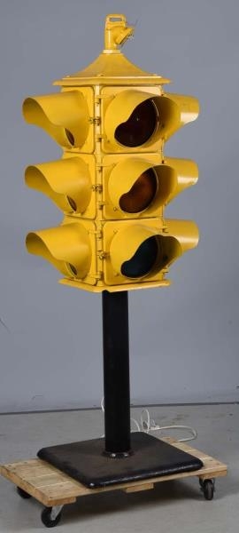4 WAY STOP LIGHT ON A STAND.                      