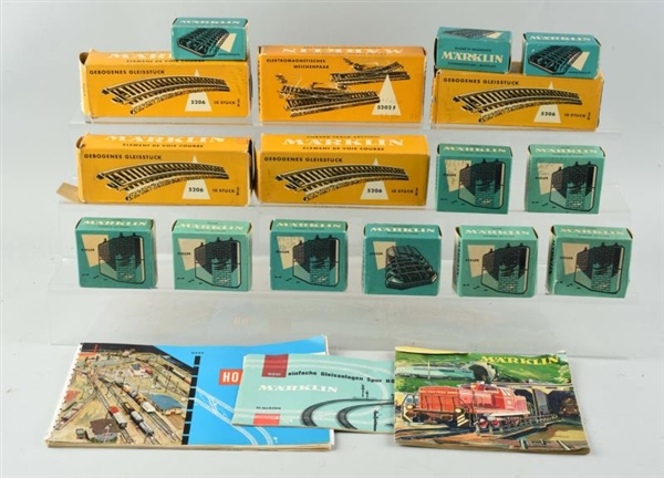 LOT OF 19: MARKLIN TRACK, SWITCHES & PAPERWORK.   