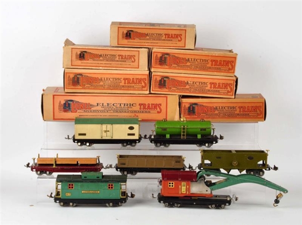 LOT OF 7: LIONEL TRAINS IN BOXES.                 