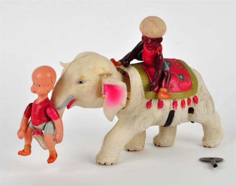 JAPANESE CELLULOID HENRY ON THE ELEPHANT TOY.     
