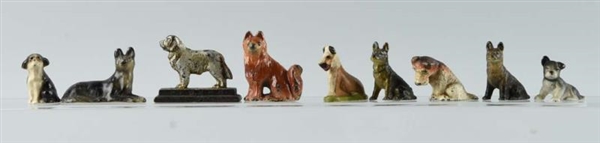 LOT OF 9: CAST IRON ASSORTED DOG PAPERWEIGHTS.    