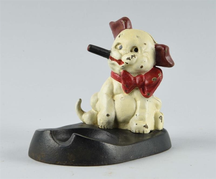 CAST IRON PUPPY WITH CIGAR ASH TRAY               