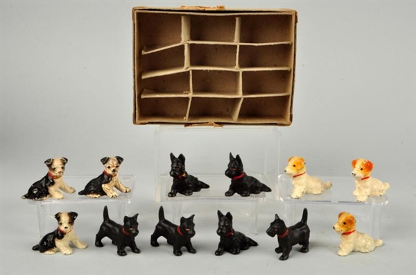 CAST IRON ASSORTED DOG PARTY FAVORS.              