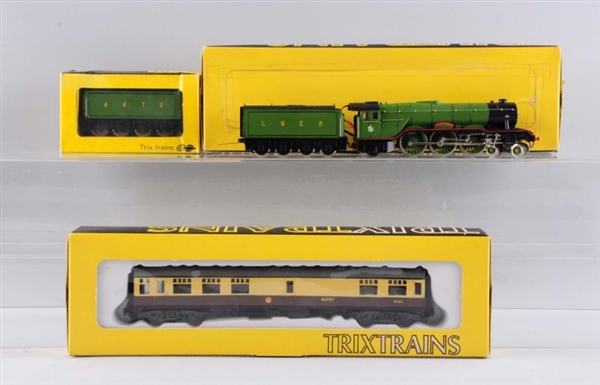LOT OF 3: TRIX LOCOMOTIVE AND CARS.               