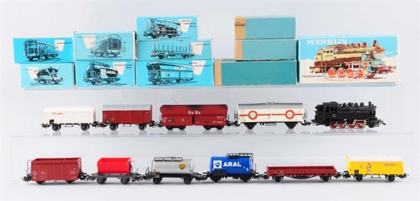 LOT OF 11:  MARKLIN LOCOMOTIVE AND ROLLING STOCK. 