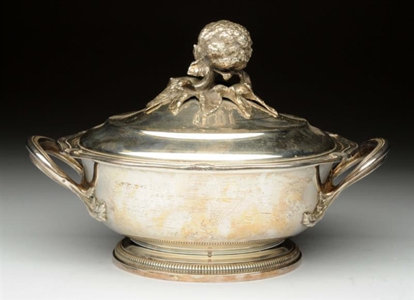 A PUIFORCAT SILVER COVERED DISH.                  