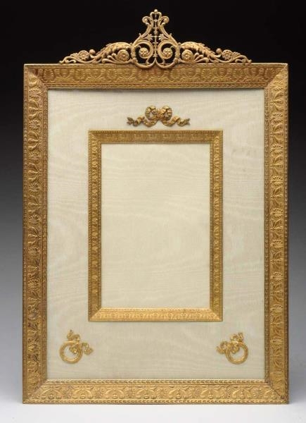 FRENCH EMPIRE STYLE BRONZE PICTURE FRAME.         