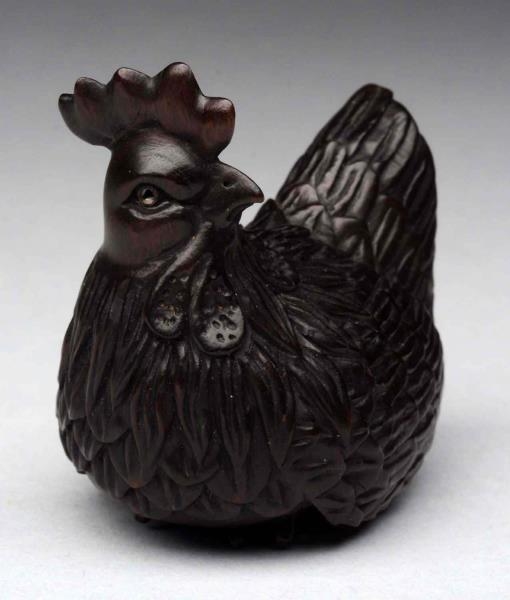 JAPANESE WOOD NETSUKE OF A ROOSTER.               