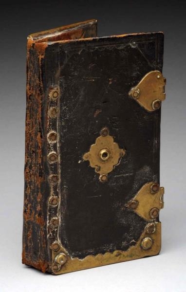 EARLY LEATHER & METAL HINGED BOOK.                