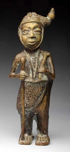 BRONZE FIGURE OF A MAN WITH WALKING STICK.        