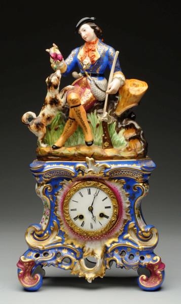 FRENCH CLOCK WITH PORCELAIN FIGURINE.             