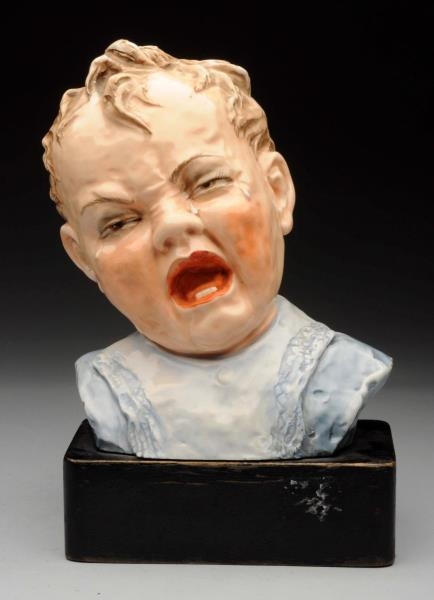 ITALIAN PORCELAIN CRY BABY STATUE.                