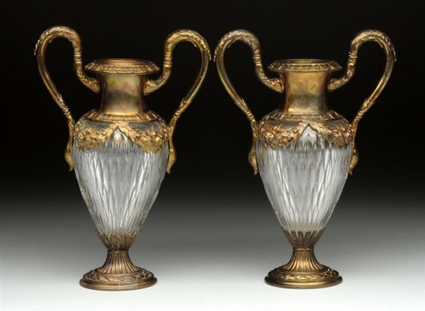 PAIR OF BRONZE MOUNTED GLASS URNS.                