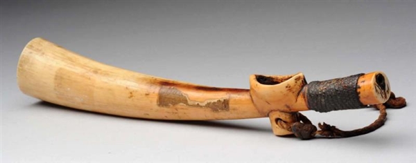 EARLY IVORY TRIBAL PIPE.                          