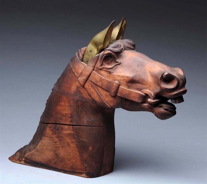 CARVED WOODEN HORSE HEAD WITH BRONZE EARS.        
