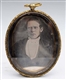 EARLY VICTORIAN GOLD FILLED LOCKET WITH PORTRAIT. 