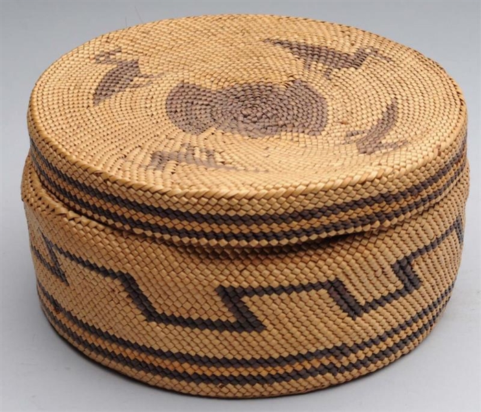 NATIVE AMERICAN INDIAN BASKET WITH A LID.         