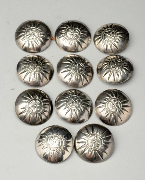 SET OF 11 NATIVE AMERICAN SILVER BUTTONS.         