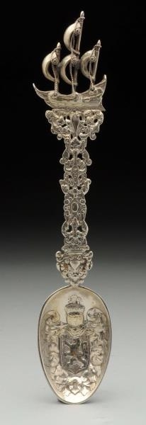 CONTINENTAL SILVER FIGURAL SERVING SPOON.         