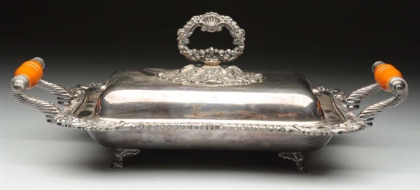 A SILVER PLATE COVERED VEGETABLE DISH.            