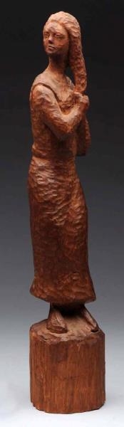 CARVED WOODED SCULPTURE OF WOMAN.                 