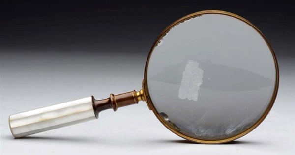 ANTIQUE BRONZE MAGNIFYING GLASS.                  