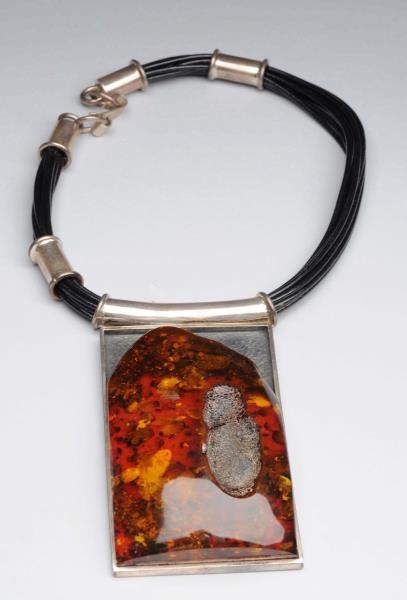 LARGE STERLING SILVER AND AMBER NECKLACE.         
